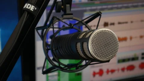 Broadcast Microphone in Shock Mount Close Shot with DAW in Background Video stock 96815219