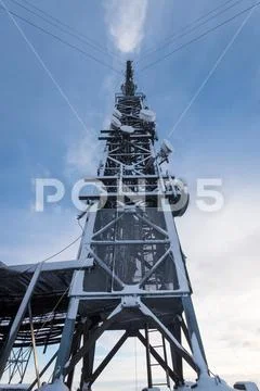 Broadcasting tower steel snow and ice Stock Photos