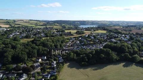 Broadsands, Devon, England: DRONE AERIAL VIEWS: Viaduct, Houses, River Dart Stock Footage 201675994