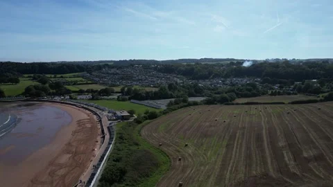 Broadsands, Devon, England: DRONE VIEWS: Hay bales and Broadsands beach Stock Footage 273566158
