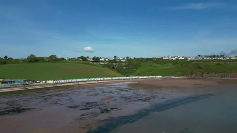 Broadsands, S. Devon, England: DRONE AERIAL VIEWS: Beach, huts &amp; steam train Stock Footage 241446244