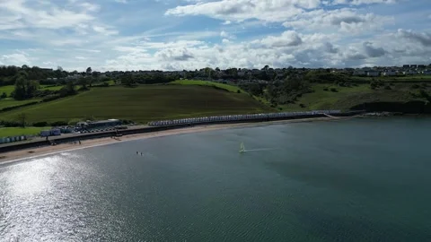 Broadsands, S. Devon, England: DRONE VIEWS: Solo windsurfer surfs just offshore Stock Footage 274367003