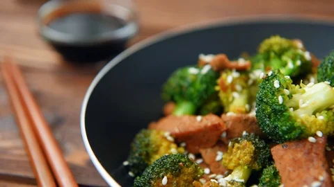 Broccoli and beef cooked on olive oil Stock Footage 70456843