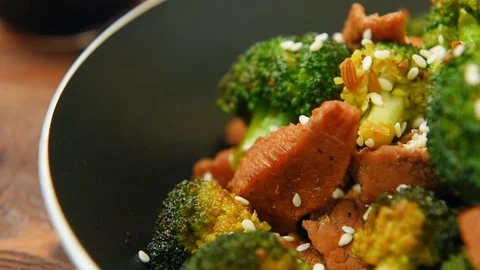 Broccoli and beef cooked on olive oil Stock Footage 70457809