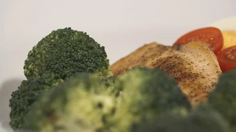 Broccoli and Chicken Breast Stock Footage 128437913