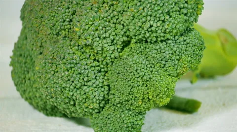 Broccoli and green beams on the white wooden table. Slider shot. Stock Footage 57530819
