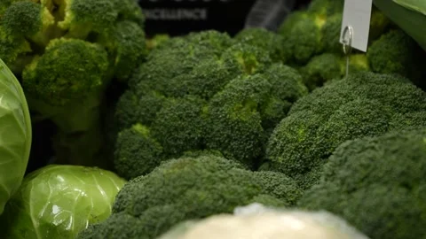 Broccoli and young white cabbage close-up. Stock Footage 232220410