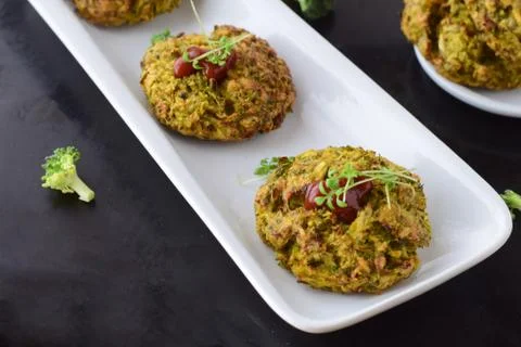 Broccoli balls deep fried with tomato sauce with fresh broccoli Stock Photos