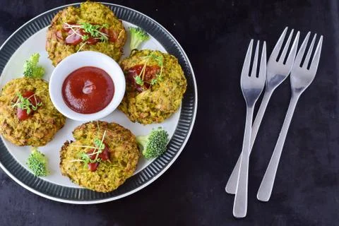 Broccoli balls deep fried with tomato sauce with fresh broccoli Stock Photos