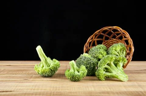 Broccoli on a black background closeup Stock Photos