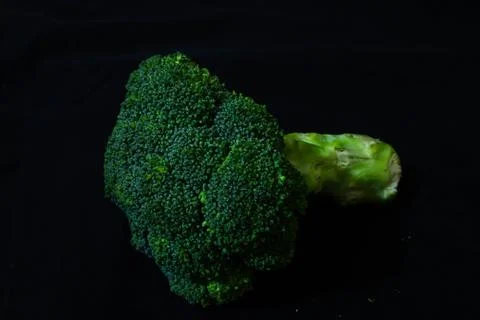 Broccoli on a black background isolated Stockfoto's