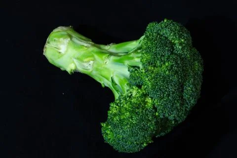 Broccoli on a black background isolated Stockfoto's