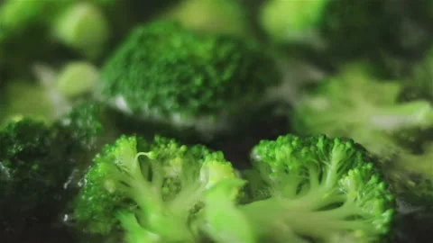 Broccoli boiling in water close up Stock Footage 102270268