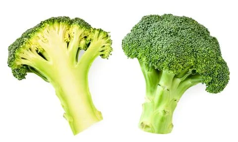 Broccoli cabbage and half on a white. The view from the top. Stock Photos
