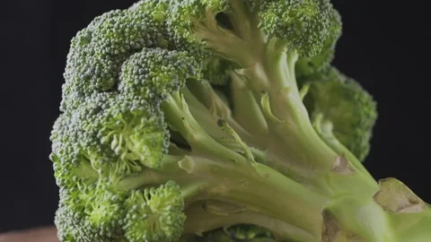 Broccoli cabbage on a dark background close-up 스톡 동영상 131718473