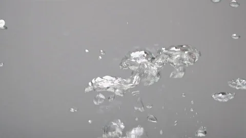 Broccoli cabbage falls into boiling water, slow motion, side view. Cooking Video stock 124310062