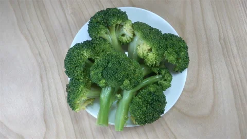 Broccoli cabbage on a plate rotated in 4K Stock Footage 150727919