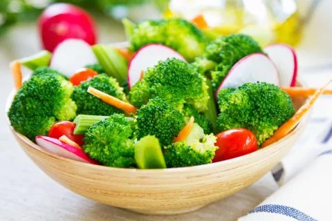 Broccoli with celery and radish salad Stock Photos
