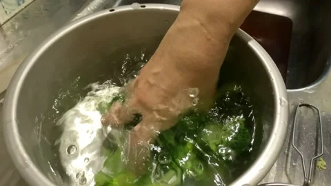 Broccoli Cooling in Ice Cold Water Stock Footage 132092969
