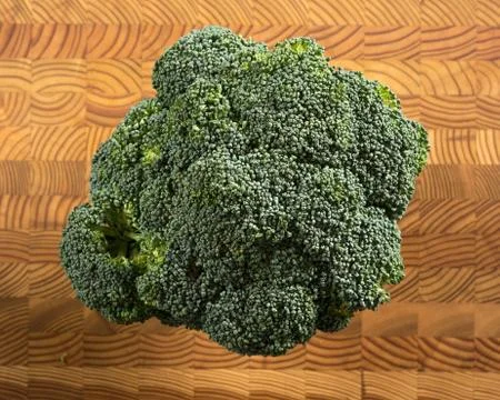 Broccoli on Cutting Board Stock Photos
