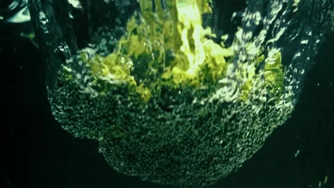 Broccoli Drops with Artsy Wake Behind It Stock Footage 300890485