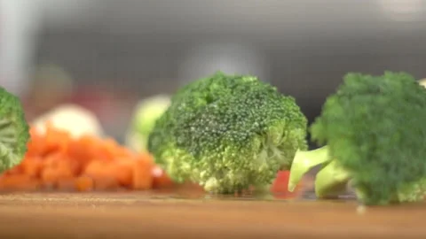 Broccoli falling in slow motion Stock Footage 160622248