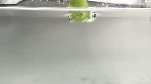 Broccoli falls, water splashes s Stock Footage 137078620