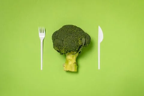 Broccoli with fork and knife Stock Photos