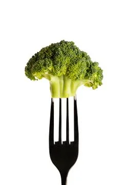 Broccoli on a fork Stock Photos