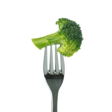 Broccoli on fork Stock Photos