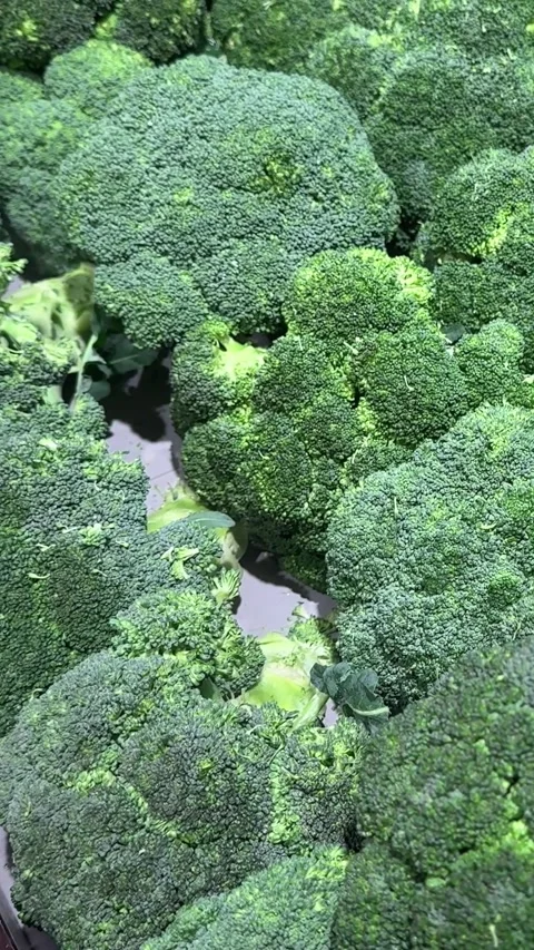 Broccoli green cabbage fresh vegetable on store counter tasty snack Stock Footage 330425765