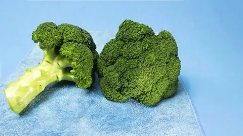 Broccoli isolated on blue background Foto stock