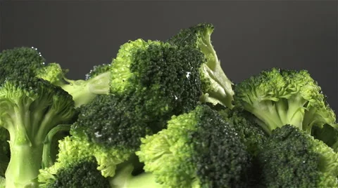 Broccoli isolated rotating on dark gray background Stock Footage 62377444