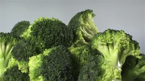 Broccoli isolated rotating on white/gray background Stock Footage 62377383