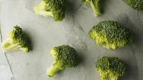 Broccoli pieces on the table Stock Footage 140029291