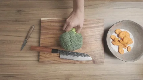 Broccoli Preparation Cutting Chopping and Slicing on Kitchen Countertop Stock-Footage 329814677