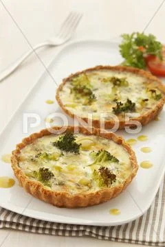 Broccoli quiches Stock Photos