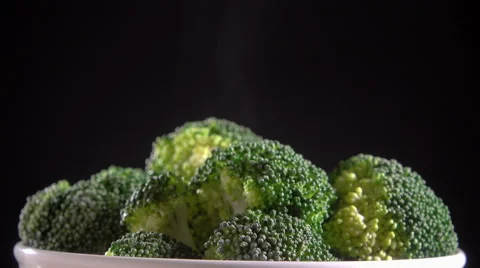 Broccoli steaming in bowl Stock Footage 58033108