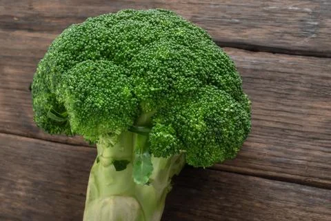 Broccoli vegetable on wood has spoon and fork healthy eating clean food con.. Stock Photos
