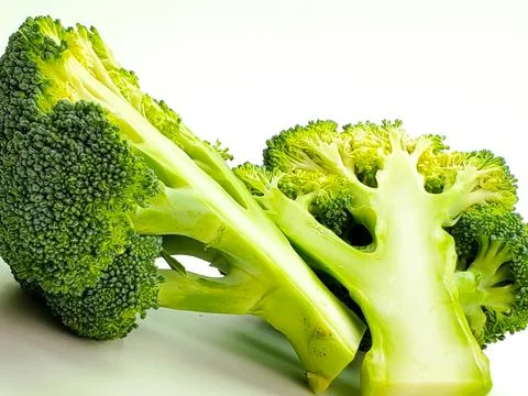 Broccoli vegetables isolated on white background. broccoli cut in half Stock Photos
