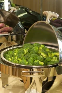 Broccoli in warming tray Stock Photos