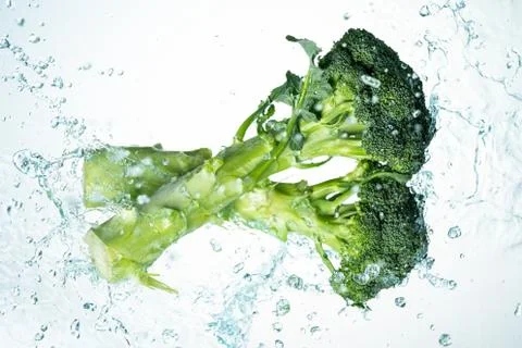 Broccoli water splash Stock Photos