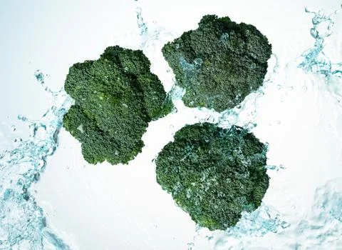 Broccoli water splash Stock Photos