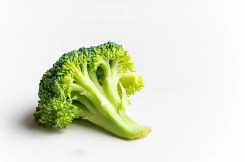 Broccoli on white surface. Stock Photos