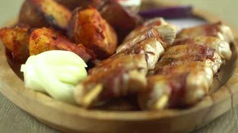 Brochette, chicken meat and baked potatoes Stock Footage 71940468