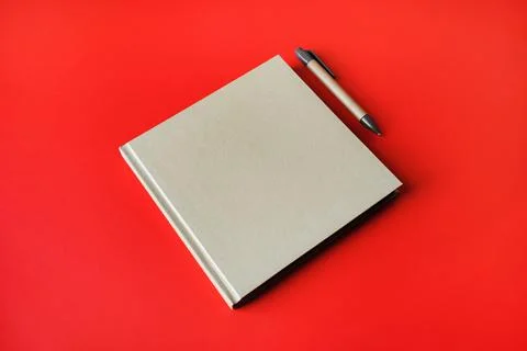 Brochure and pen Stock Photos