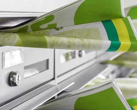 Brochures in mailboxes Stock Photos