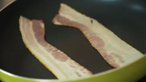 Broiling Bacon in a pan Stock Footage 86854518