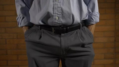 A broke and penniless man pulls out his pockets to prove it Stock Footage 263269455