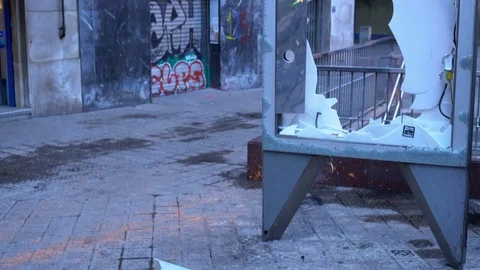 Broken advertising lightbox on the background of a burnt pharmacy Stock Footage 118304660